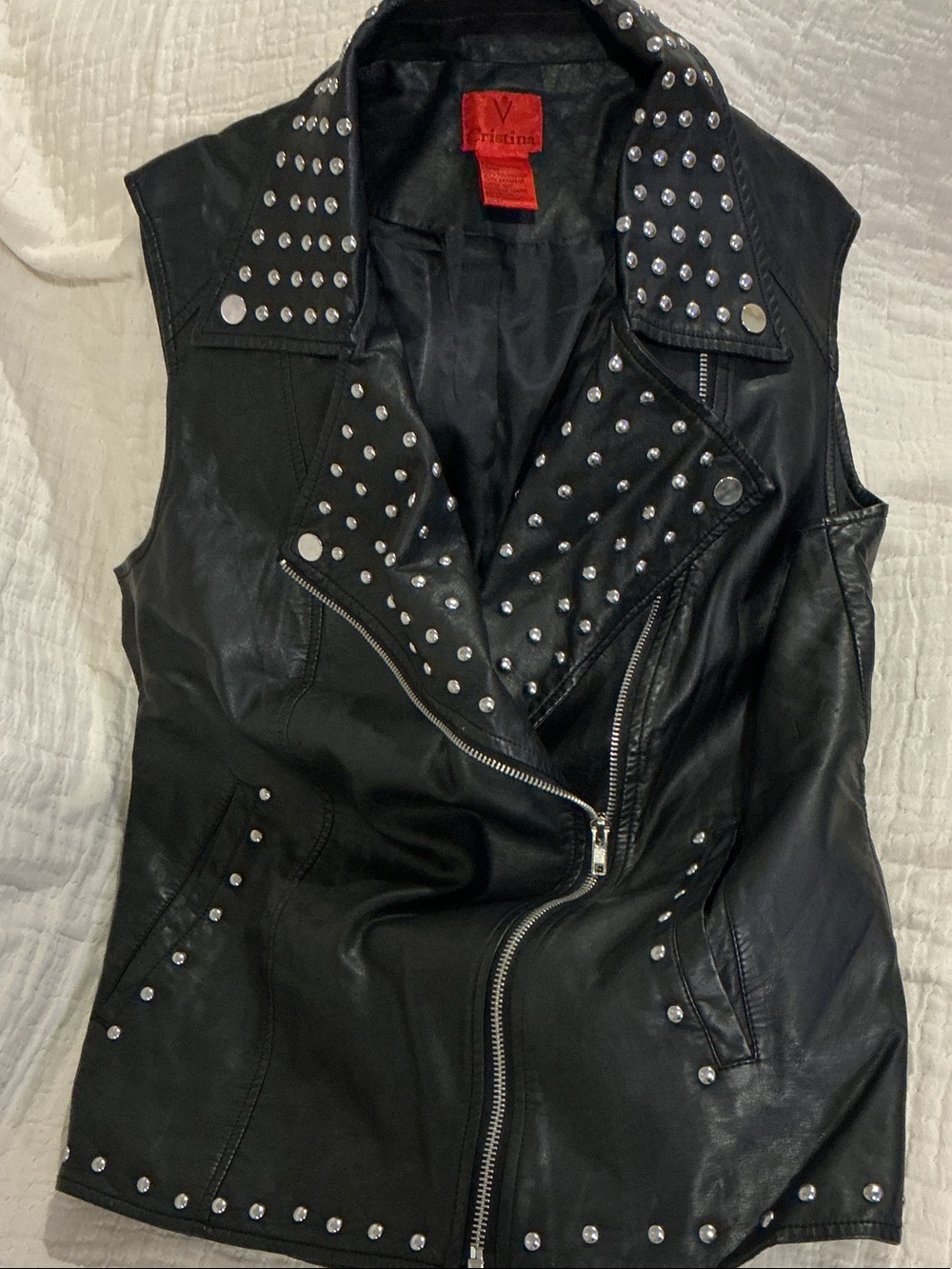 Black leather vest with silver studs